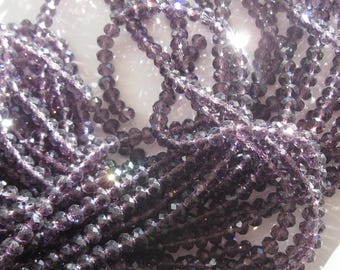 50 (BC32) 9-10mm plum colored glass beads-