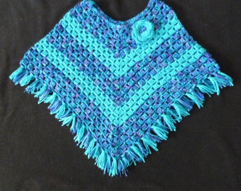Girl's Crocheted Poncho with Flower Clip