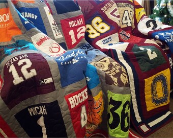 Sports jersey quilt. Custom made t-shirt quilt from 9 to 49 t shirts. Dorm tshirt quilt. Memory tee shirt quilt.