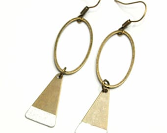 Earrings are made of silver paper