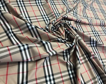 Plaid beige cotton. Checkered cotton fabric stretch.