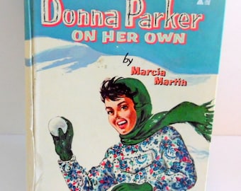 Donna Parker on her own by Marcia Martin. It is dated 1957 by Whitman's publishing