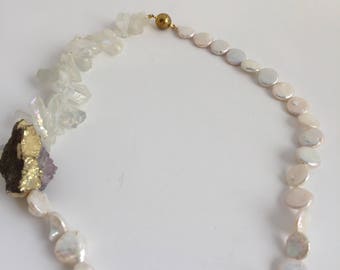 Statement white necklace.