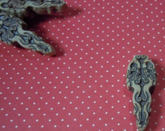 Unglazed Facing Dragons Pendants (2)