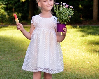 White dotty dress, flower girl