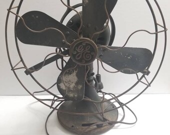 Vintage green general electric fan , parts only