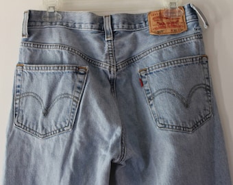 Vintage LEVI'S LEVI STRAUSS W30 L34 light wash high waisted denim jeans