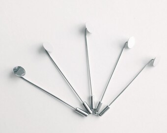 10 sets of Lapel Pin Hardware , 10mm Flat Glue Pad , 65mm Pin Length , comes with Cap , Silver Color