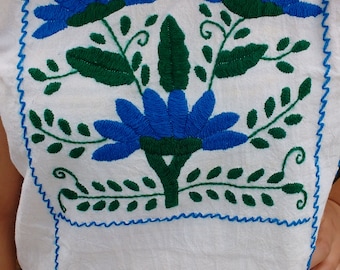 Beautiful blanket blouse with embroidery, with vivid blue color....