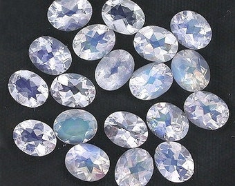 one 5x4 oval faceted rainbow moonstone gemstone gem