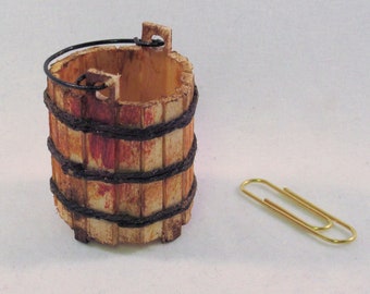 Medieval wooden bucket or pail, wire handle, tiny legs, aged wood, staves bound with cord. 1 to 12 dollhouse scale. Handmade USA.