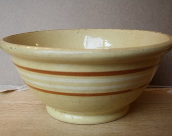 Yellow ware large mixing bowl with tan and white bands