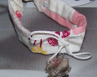 child bracelet entirely tissuavec charm