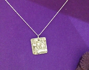 Reticulated silver pendant