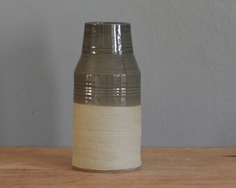 ready made vase. sand colored stoneware clay pottery with slate grey glaze