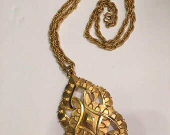 Large Trifari gold pendant necklace.