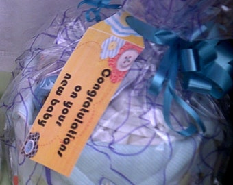 Fabric Basket, Baby Shower Gift, contains a range of new born items