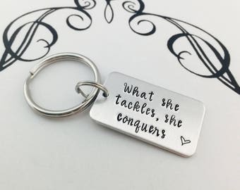What she tackles, she conquers - Hand Stamped Keychain - Graduation Gift - Pop Culture - Strong Women - Motivational Key Chain