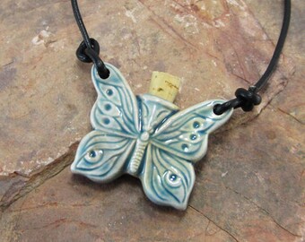 Peruvian Ceramic Raku Butterfly Wings Bottle