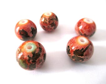 5 orange speckled green glass beads 12mm