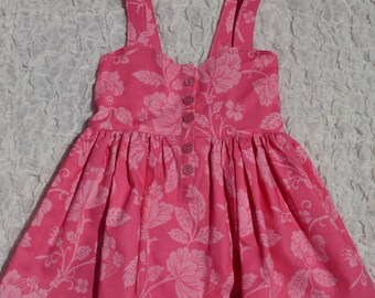Girls Pink floral button-front peplum top. Size 4