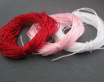 3 x 10 m 0.8 mm weave - red/pink/white nylon thread