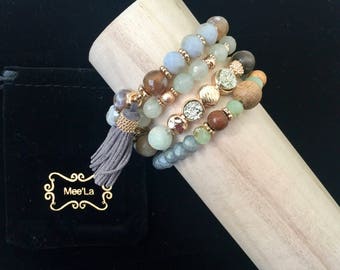 Mee'La Stackable Stretch Bracelets (4) with tassel.