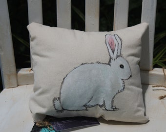 white bunny pillow