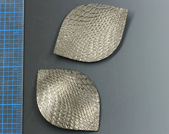 Gunmetal shield shape vintage stamping, heavy texture. Vintage concave. 2 1/4" x 1 5/8". Priced per stamping. Beadwork, Jewelry supply.