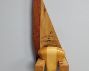 Display your favorite paddles in a unique hardwood rack. Fully assembled, ready to hang, and stamped "Handcrafted by Navarro Canoe Co."