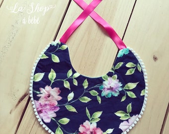 Bib reversible with tassels