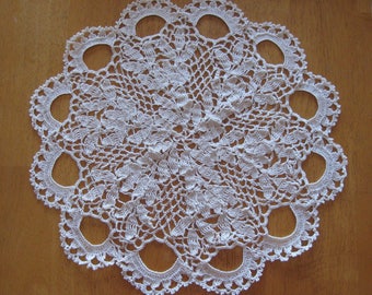 New ecru hand-crocheted doily