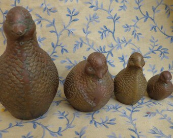 quail family figurines