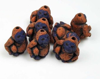 10 Tiny Orangatang Beads - CB472