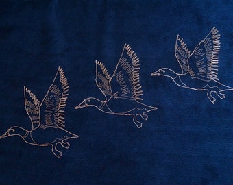 Three wire flying ducks