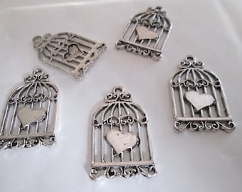 5 charm silver heart in metal cage 32 x 18 mm