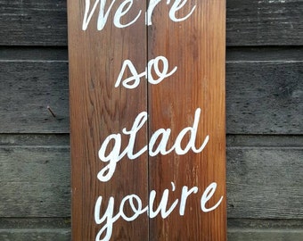 Handpainted Reclaimed Wood "We're So Glad You're Here" Sign
