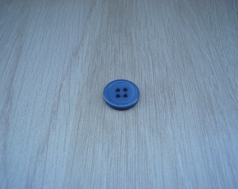 small blue button round with RIM