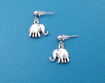 Elephant earrings in silver toned metal. Elephant earrings. Elephant charms. Elephant jewelry.