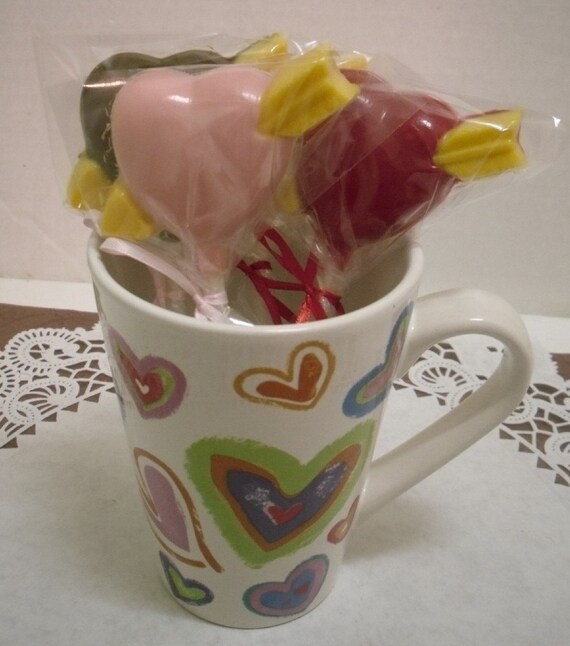 A dozen heart and arrow lollipops