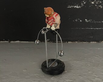 Baby bear kinetic toy - tightrope walker - German metallic toy
