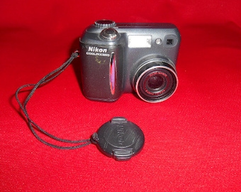 One (1), Vintage Nikon, Cool Pix 855, Digital Camera.