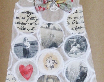 Collage on brown paper, memory dress, paper dress, Liberty silk bow and lace, stitched paper