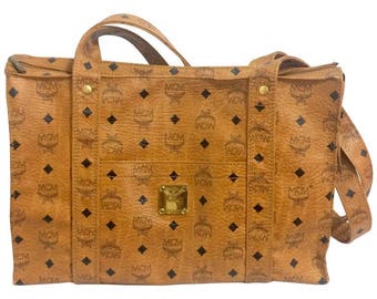 Vintage MCM brown monogram large tote bag with long straps. Classic style for unisex use. By Michael Cromer. Made in Germany