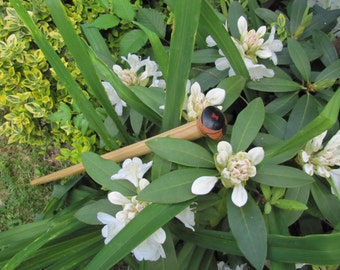Child's walking stick with black widow spider