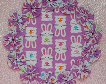 Bunnies with Easter Eggs on Lavender Yo Yo Doily