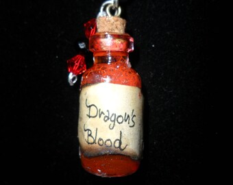 Pendant with glass flask "Dragonblood"