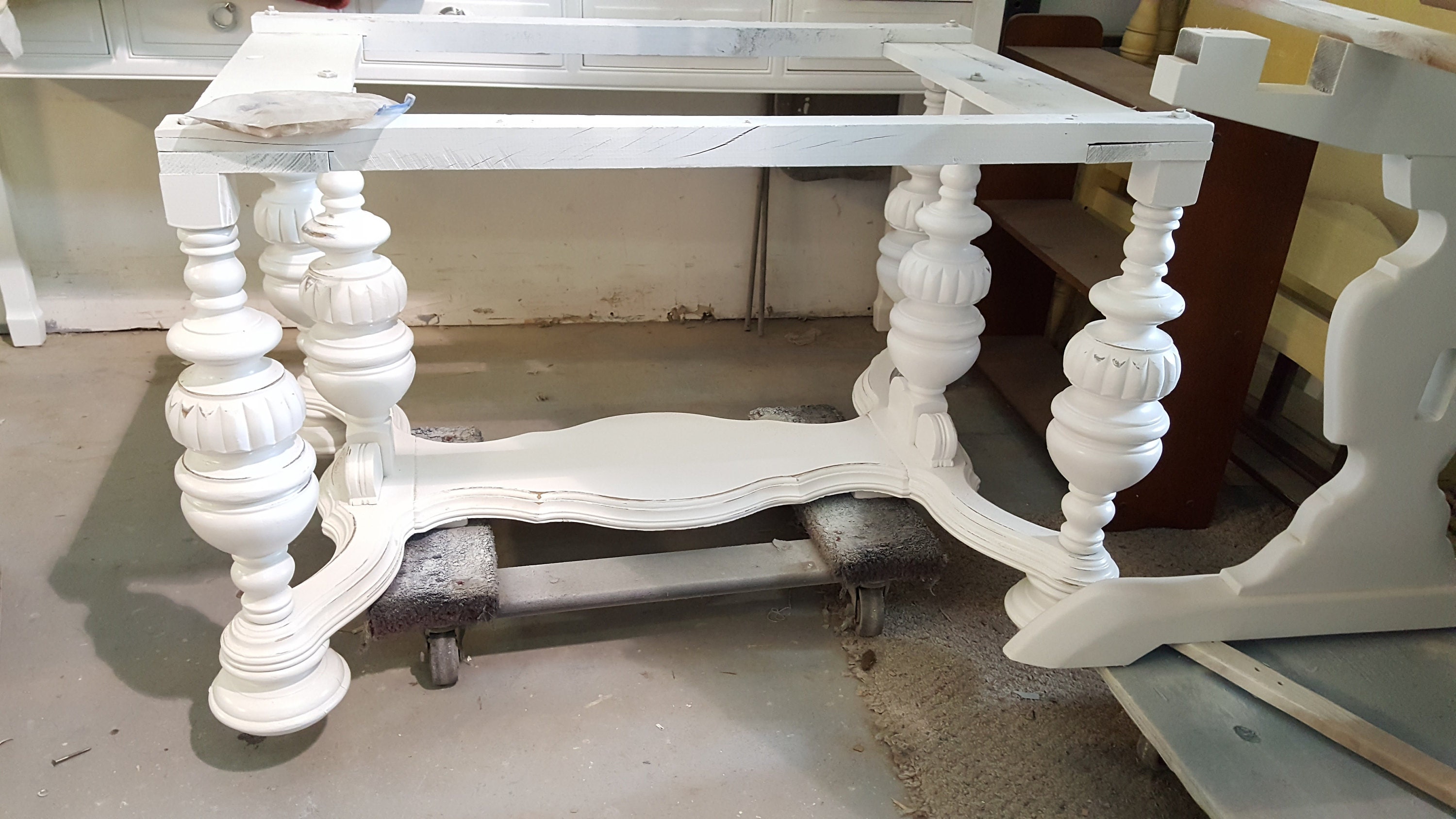 Bottom freshly repainted in creamy white, distressed