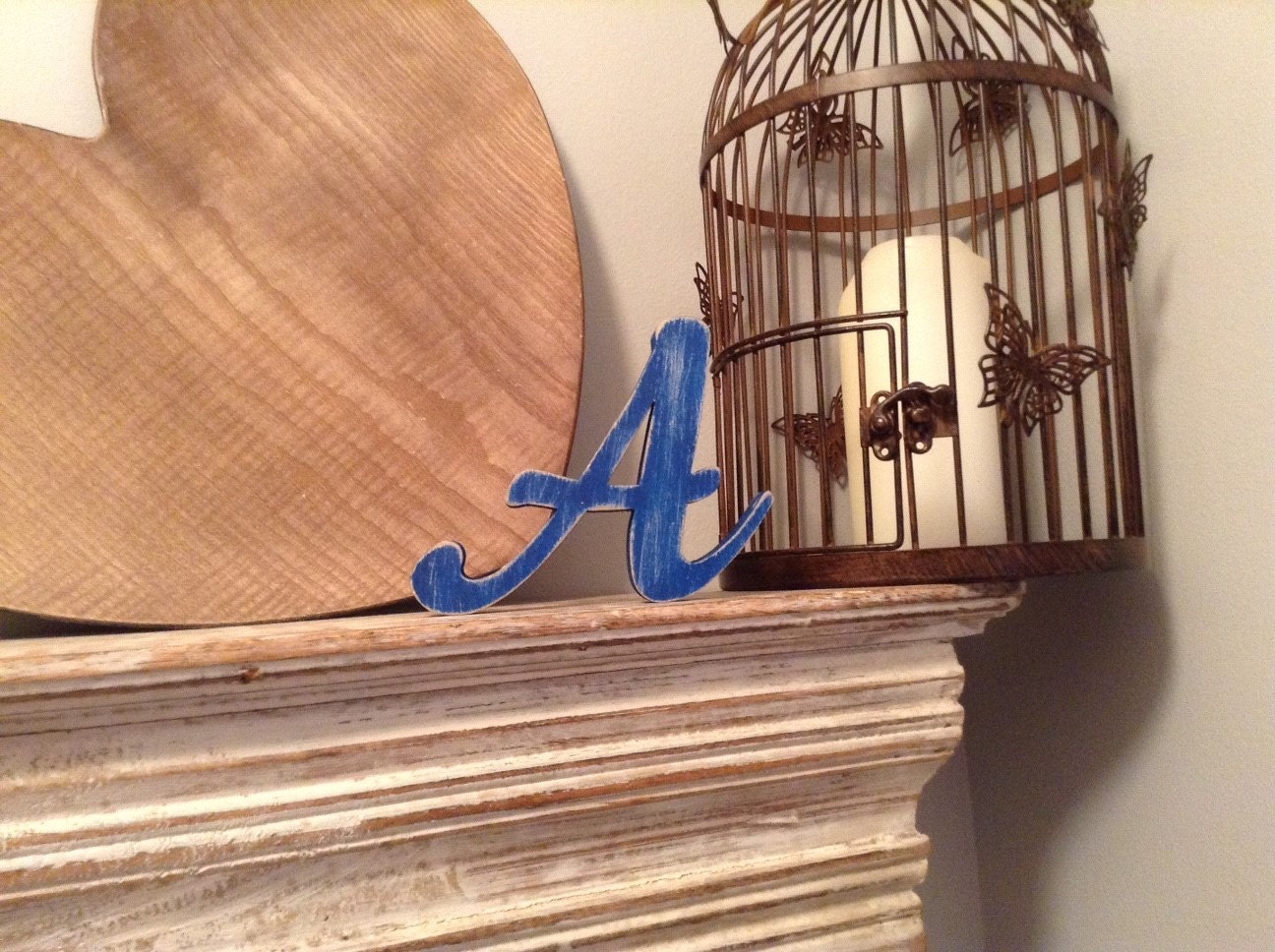 Letter A in Machiarge font, shown in Union Jack, with a distressed finish