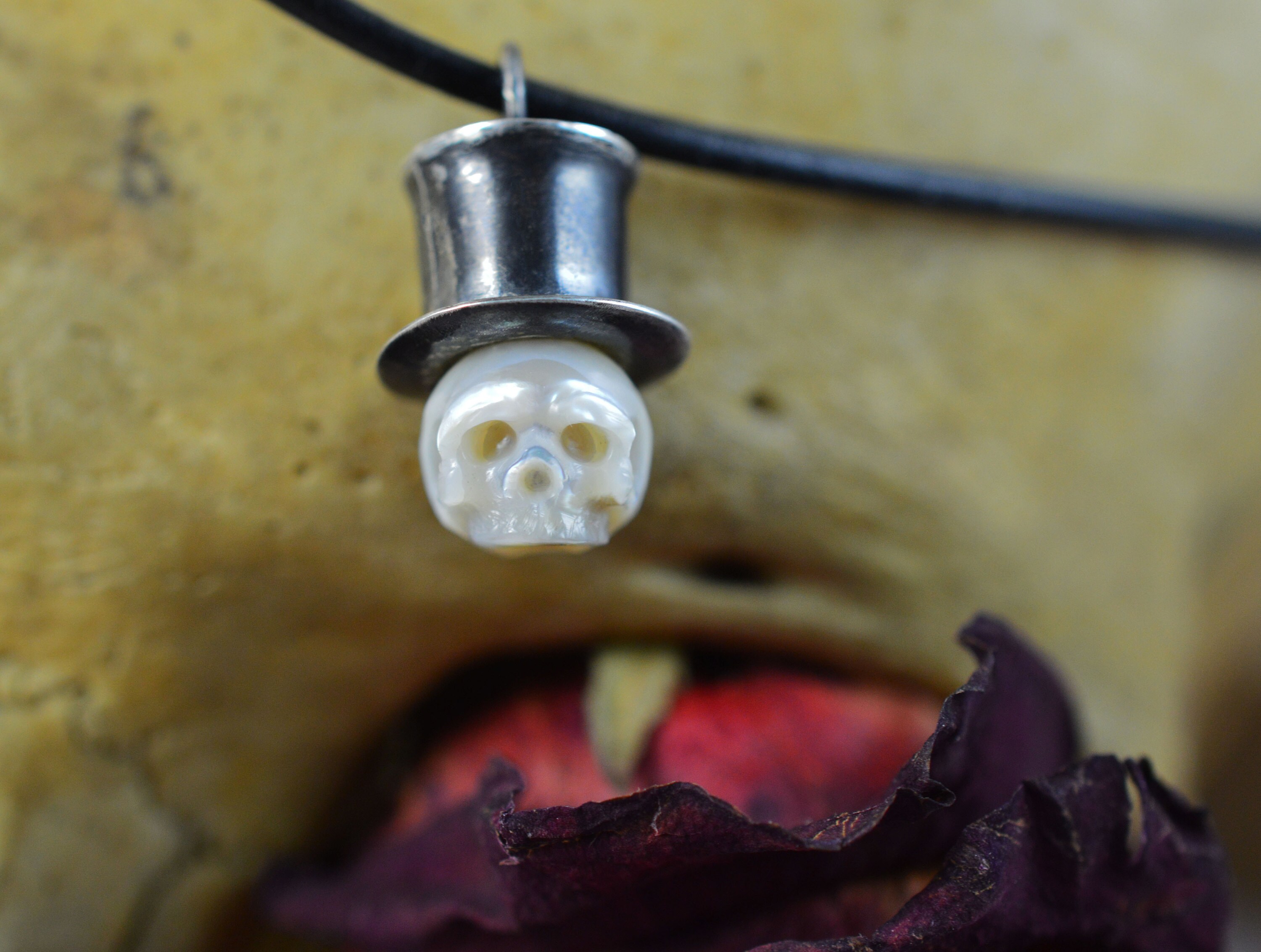 Hand Carved Pearl Skull Wearing Top Hat Necklace